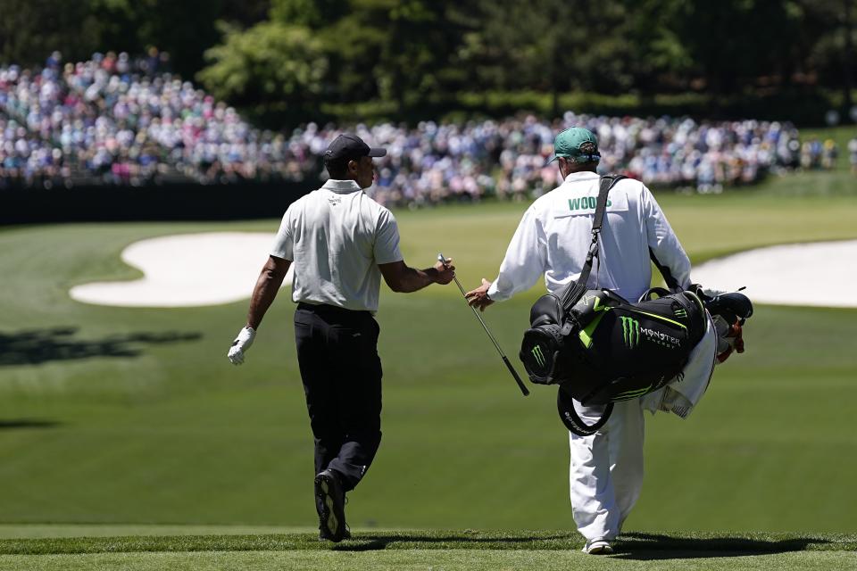 Tiger Woods walks to the green on the fourth hole during third round at the Masters golf tournament at Augusta National Golf Club Saturday, April 13, 2024, in Augusta, Ga. (AP Photo/George Walker IV)