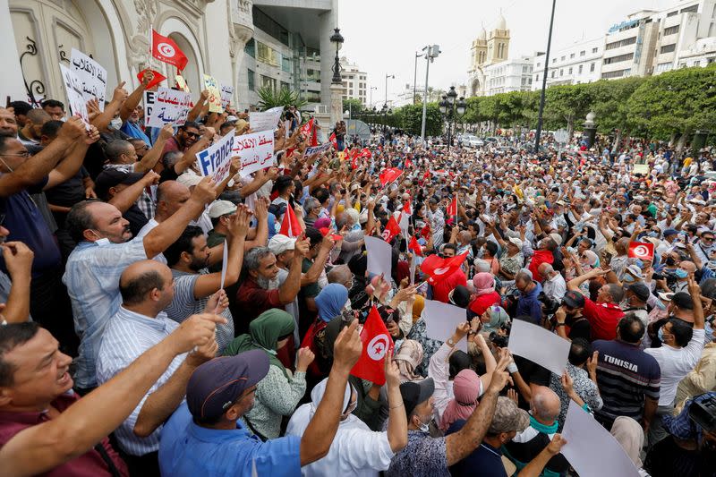 Opponents of Tunisia's President Kais Saied protest against what they call his coup on July 25, in Tunis