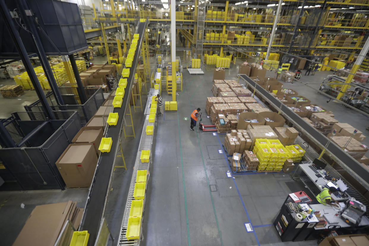 General scenes inside the Amazon Fulfillment center in Robbinsville Township, N.J., Tuesday, Aug. 1, 2017. Amazon held a nation-wide job fair at its warehouses on Aug. 2. (AP Photo/Julio Cortez)