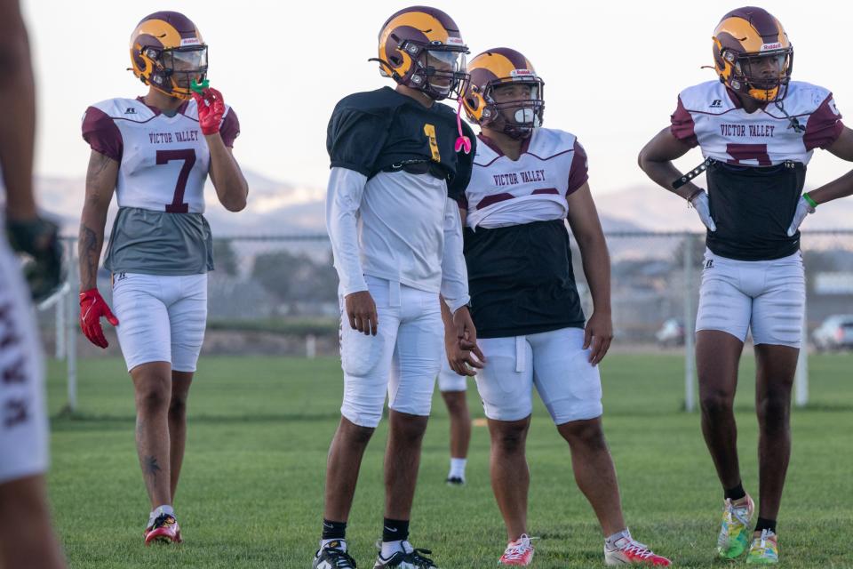Victor Valley's Carlos Anaya, left, Miguel Larios, center and Omari McCullough, far right, are expected to be key players on offense this season. The Rams begin the season this weekend against Santa Monica College.