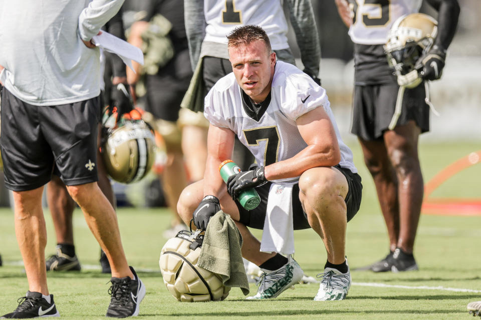 Taysom Hill takes a breather at training camp. (Stephen Lew/Reuters)