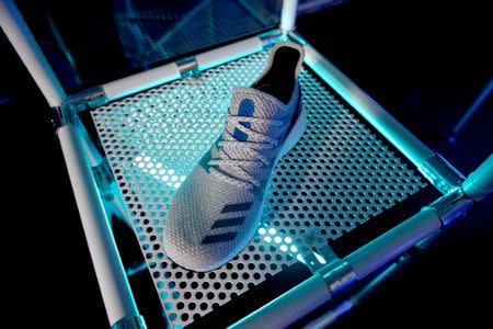 A sample AM4LDN shoe is displayed, at the launch of Adidas' new shoe line, made in a factory largely operated by robots, in London, Britain October 19, 2017. REUTERS/Mary Turner