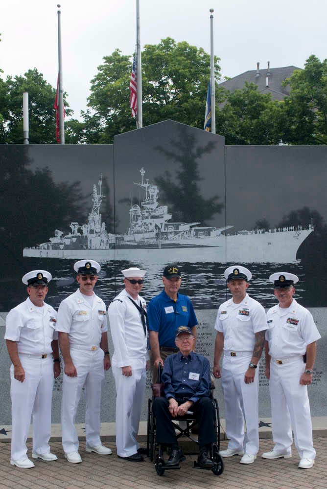 Cleatus Lebow, in wheelchair, is seen at a previous reunion at the USS Indianapolis. Lebow, one of the last two remaining survivors, died Sept. 29; he was 98.