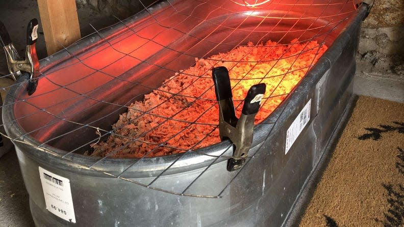 I used a metal stock tank to set up my chicken brooder.