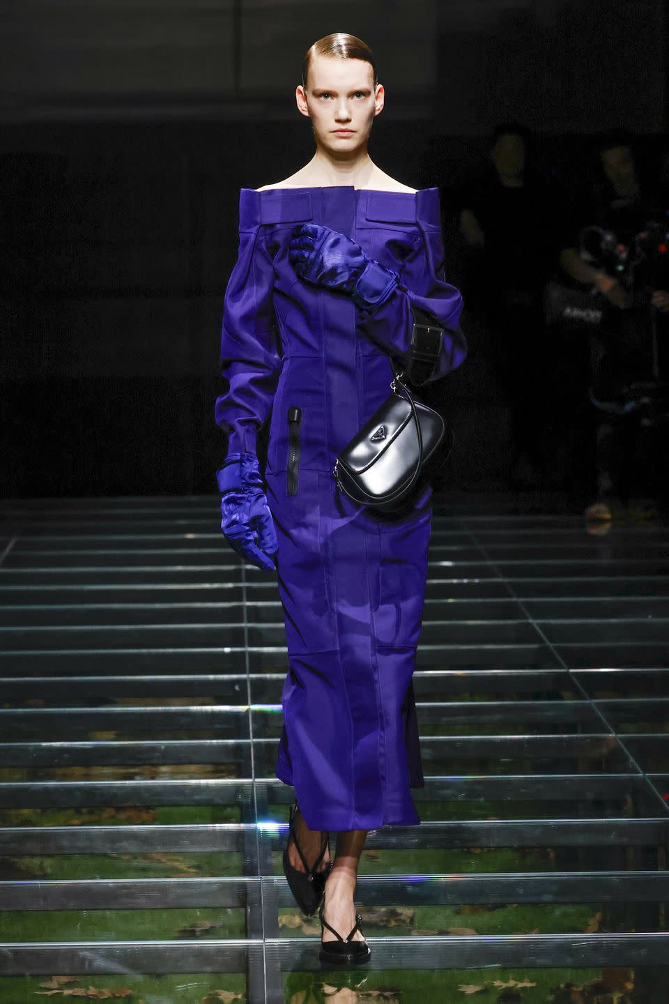 a person wearing a purple dress and a helmet