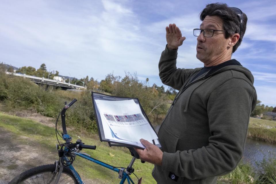 Frank Barron stands near his bike.