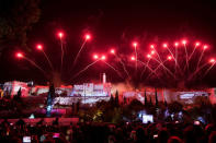 Fireworks are seen over the walls of the Jerusalem Old City during an event marking the 50th anniversary of Israel's capture of East Jerusalem during the 1967 Six-Day War, opposite the Old City wall and near the Tower of David in Jerusalem May 21, 2017. REUTERS/Abir Sultan/Pool