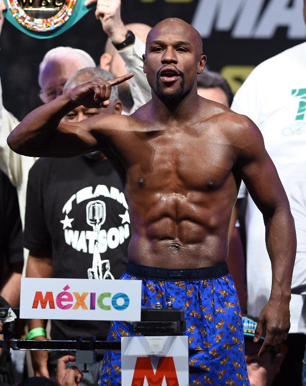 WBC/WBA welterweight champion Floyd Mayweather during his official weigh-in in Las Vegas on September 12, 2014 before his figth against Marcos Maidana