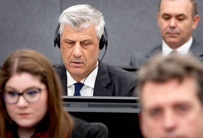 Former Kosovo President Hashim Thaci attends his war crimes trial in The Hague