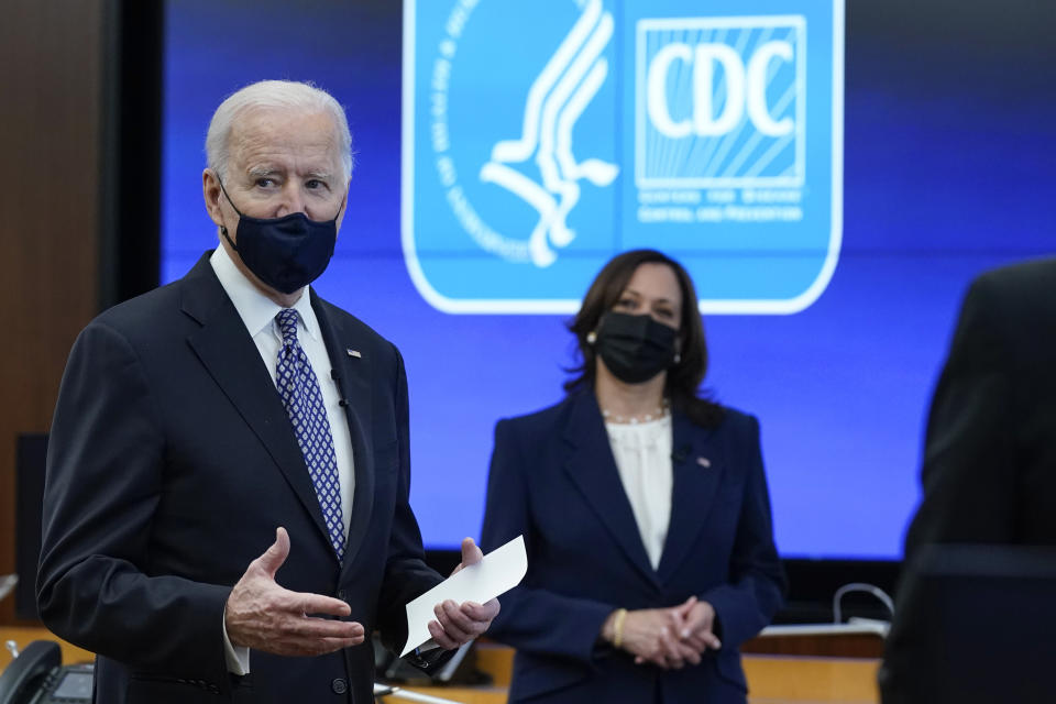 President Joe Biden speaks as Vice President Kamala Harris listens during a COVID-19 briefing at the headquarters for the Centers for Disease Control and Prevention, Friday, March 19, 2021, in Atlanta. (AP Photo/Patrick Semansky)