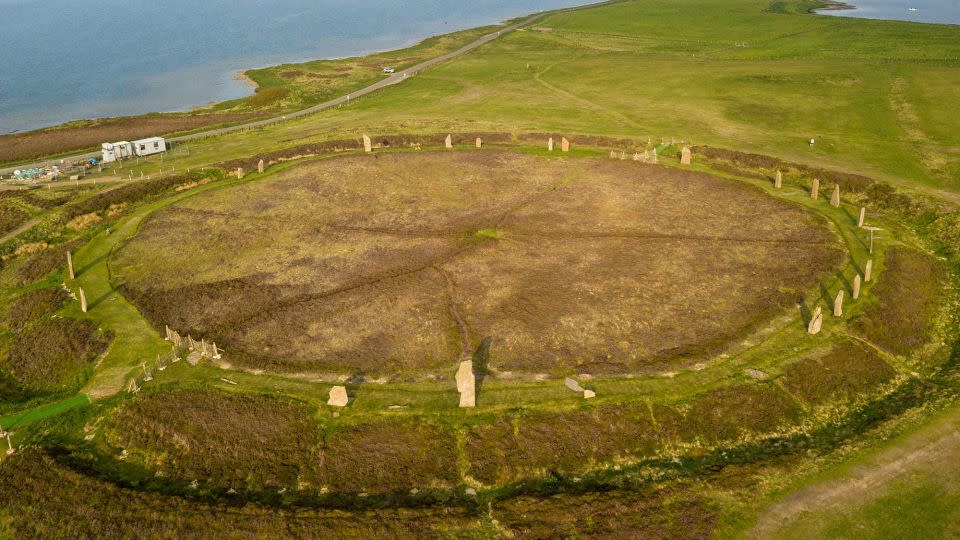 An aerial view shows the vast Ring of Brodgar, a huge ceremonial stone circle on the mainland dating back to the third millennium BC. - T Schaeffer/imageBROKER/Shutterstock