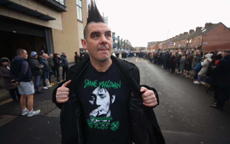 John Farrell outside Shelbourne Park Stadium waiting for Shane MacGowan's funeral procession to make its way through the streets of Dublin