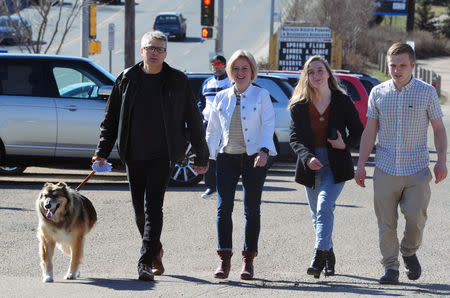 Alberta New Democratic (NDP) leader and Premier Rachel Notley arrives at the polling station with her husband Lou Arab, daughter Sophie Arab, 18, son Ethan Notley, 20 and dog Tucker to cast their ballots during the provincial election in Edmonton, Alberta, Canada, April 16, 2019. REUTERS/Candace Elliott