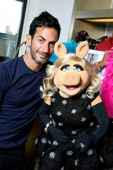 Miss Piggy with Marc Jacobs wearing one of his designs in New York City.