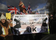 People attend the "Brexit Betrayal Rally", a pro-Brexit rally, on Park Lane in London, Sunday, Dec, 9, 2018. MP's are to vote on the EU withdrawal agreement on Tuesday. (AP Photo/Tim Ireland)