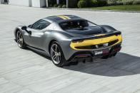 <p>Ferrari has just introduced its newest mid-engine supercar, and it has a V-6. The 296 GTB is powered by a newly developed 120-degree twin-turbo V-6 engine paired to an electric motor, making a total of 818 horsepower. All of the torque goes to the rear wheels via the same eight-speed DCT found in the SF90 Stradale. There are also new looks and a shorter wheelbase. </p><p><a class="link " href="https://www.roadandtrack.com/news/a36820463/2022-ferrari-296-gtb/" rel="nofollow noopener" target="_blank" data-ylk="slk:See the full story right here;elm:context_link;itc:0;sec:content-canvas">See the full story right here</a></p>