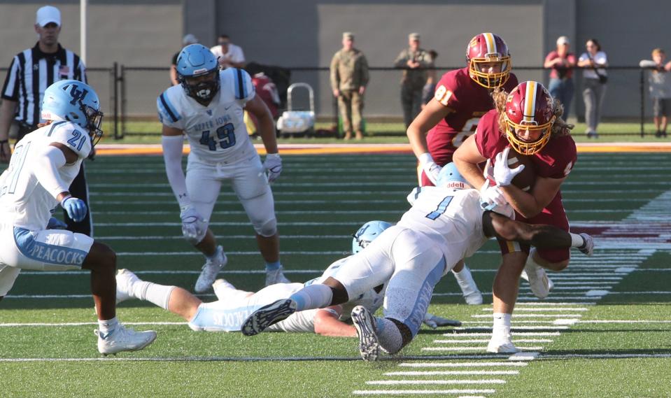 Running Back Brett Brenton churns ahead for more yardage during Northern State's game against Upper Iowa on Sept. 1 at Dacotah Bank Stadium. The Wolves are back in action Saturday against Minnesota State, Mankato.