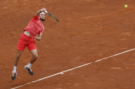 Stefanos Tsitsipas of Greece plays a shot to Casper Ruud of Norway during the final of the Barcelona Open tennis tournament in Barcelona, Spain, Sunday, April 21, 2024. (AP Photo/Joan Monfort)