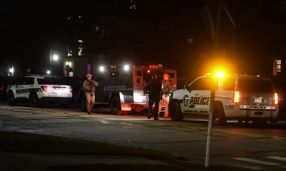 First responders prepare to sweep Snyder Hall on the campus of Michigan State University in East Lansing, Mich., Monday, Feb. 13, 2023.