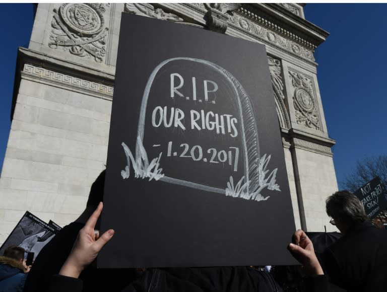 Activists stage a New Orleans-style funeral procession in Washington Square Park in New York on February 18, 2017, to mourn the death of the US presidency