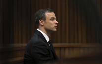 South African Paralympic and Olympic track star Oscar Pistorius looks on during his trial at the high court in Pretoria April 7, 2014. REUTERS/Themba Hadebe/Pool