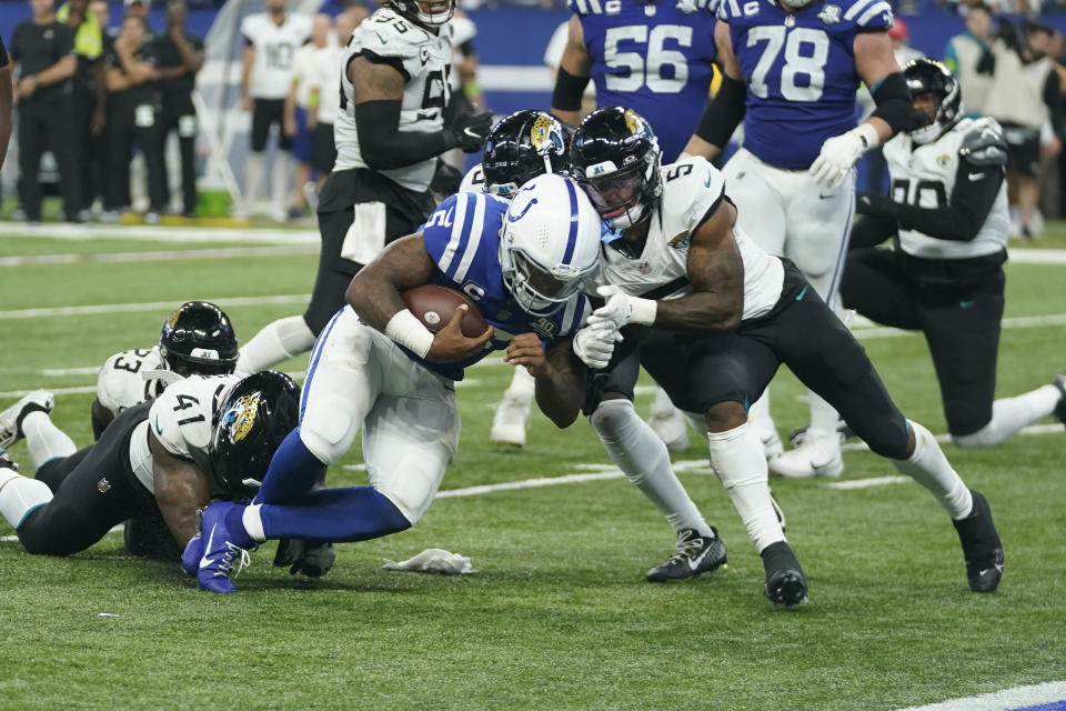 Indianapolis Colts quarterback Anthony Richardson is injured as he is hit by Jacksonville Jaguars safety Andre Cisco, right, during the second half of an NFL football game Sunday, Sept. 10, 2023, in Indianapolis. The Jaguars won 31-21. (AP Photo/Darron Cummings)