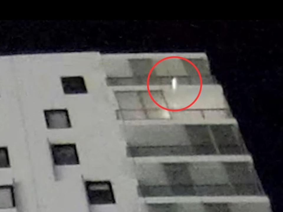 A phone flies from the balcony of this Liverpool apartment. Picture NSW Police.JPG