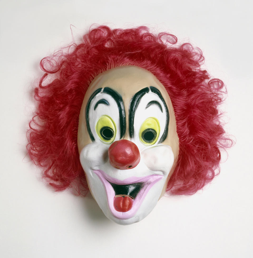 The&nbsp;father allegedly told police that he was only trying to discipline his daughter when he put on the clown mask, a similar one seen here, to scare her. (Photo: Dorling Kindersley via Getty Images)