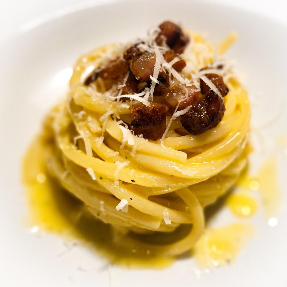 Pasta carbonara is made with eggs, cheese, cured pork and black pepper. (Photo: Amarone Kitchen and Wine)