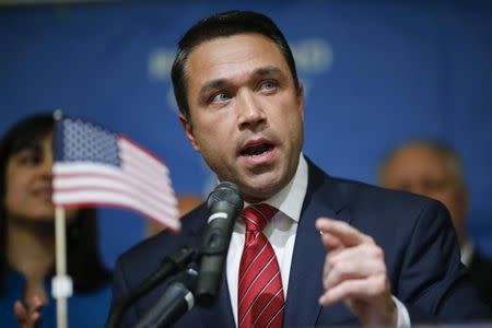 Republican Congressman Michael Grimm speaks after being re-elected in the U.S. midterm elections in Staten Island, New York, November 4, 2014. REUTERS/Eduardo Munoz