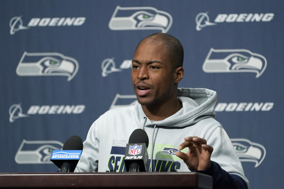 Seattle Seahawks wide receiver Tyler Lockett talks to reporters, Wednesday, Sept. 22, 2021, in Renton, Wash. The Seahawks are scheduled to play the Minnesota Vikings on Sunday in an NFL football game. (AP Photo/Ted S. Warren)