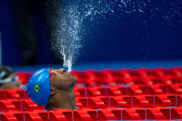 Brazil's Gabriel Geraldo do Santos Araujo celebrates his silver medal in the men's 100m backstroke - S2 final