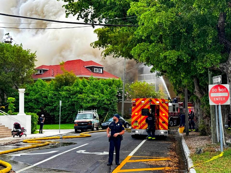 Firefighters work at the scene.