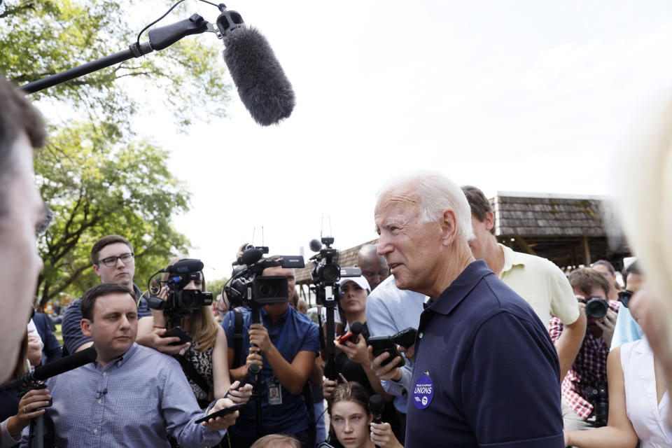 Democratic presidential candidate former Vice President Joe Biden speaks to reporters during the Hawkeye Area Labor Council Labor Day Picnic, Monday, Sept. 2, 2019, in Cedar Rapids, Iowa. (AP Photo/Charlie Neibergall)