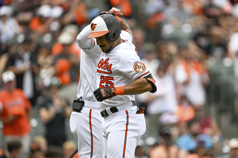 Baltimore Orioles' Anthony Santander (25) celebrates his two-run home run hit against Miami Marlins relief pitcher Steven Okert during the first inning of a baseball game, Sunday, July 16, 2023, in Baltimore. (AP Photo/Terrance Williams)