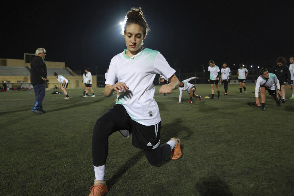 Players of the Orthodox Club's women's team practice in Amman, Jordan, Saturday, Oct. 22, 2022. Women's soccer has been long been neglected in the Middle East, a region that is mad for the men's game and hosts the World Cup for the first time this month in Qatar. (AP Photo/Raad AL-Adayleh)