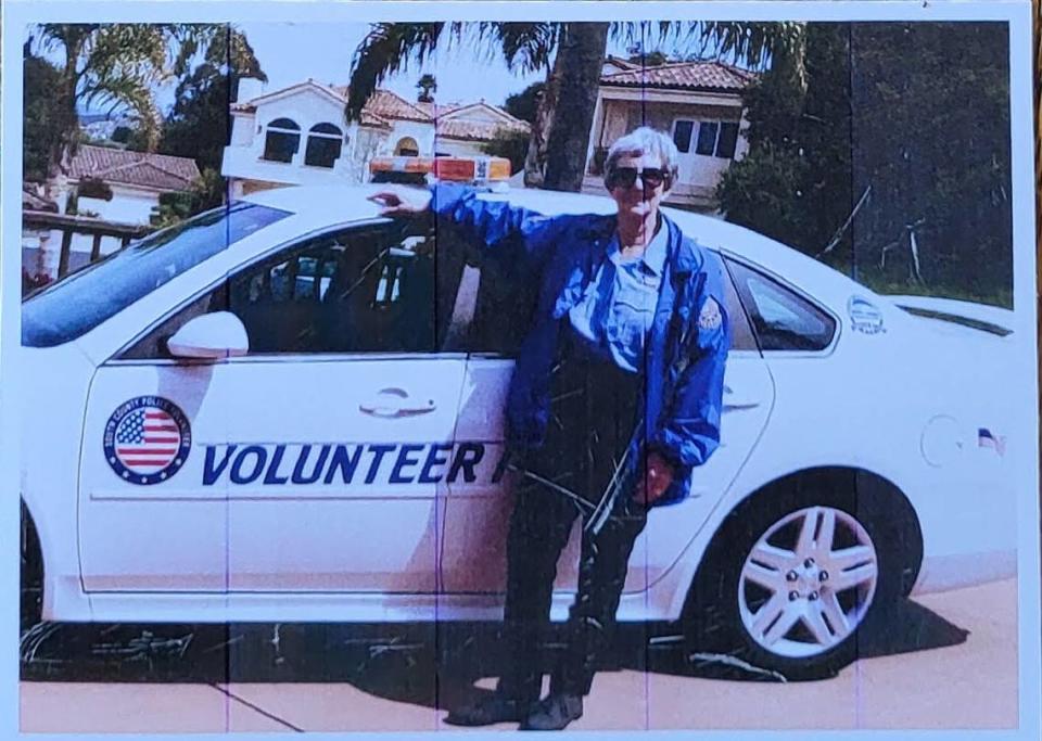 Former Grover Beach City Council member Barbara Nicolls poses with a police volunteer car. Nicolls died on Jan. 31, 2024. Courtesy Christa Spates