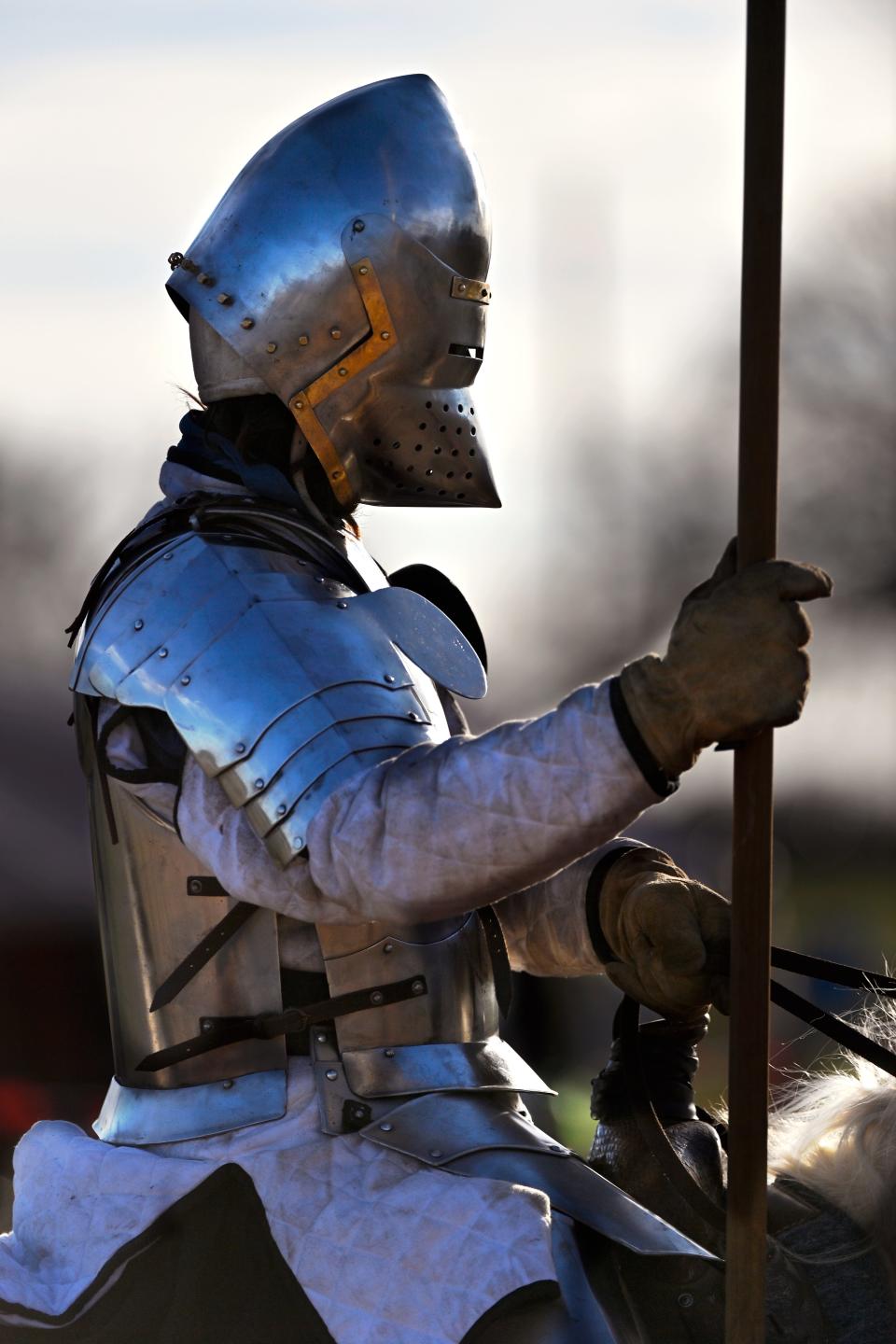 Tony May rides out to the arena wearing plate armor during the Heartlands Renaissance Festival near Gustine March 2.