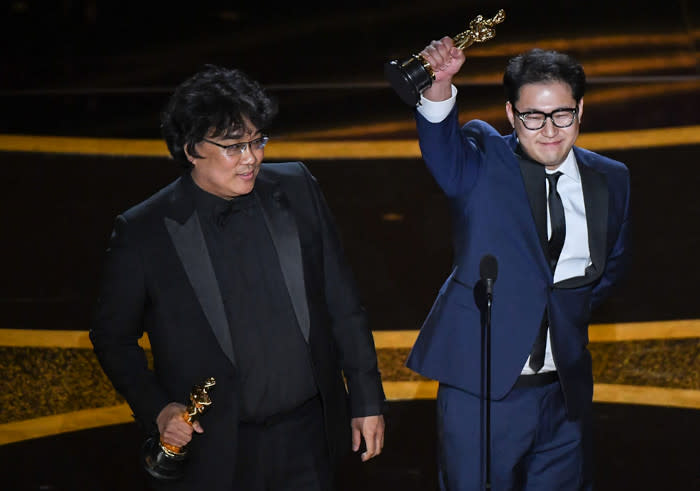 Han Jin-Won and Bong Joon-Ho with their Oscars