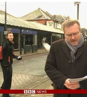 TV journalist pelted with snowball