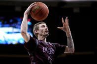 Freed-Hardeman guard Chase Fiddler shoots during the first half of the NAIA men's national championship college basketball game against Langston, Tuesday, March 26, 2024, in Kansas City, Mo. (AP Photo/Charlie Riedel)