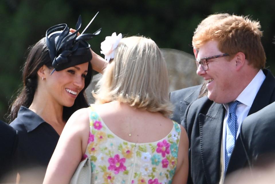 <p>Here is Meghan having a chat with Celia and her husband, George Woodhouse.</p>