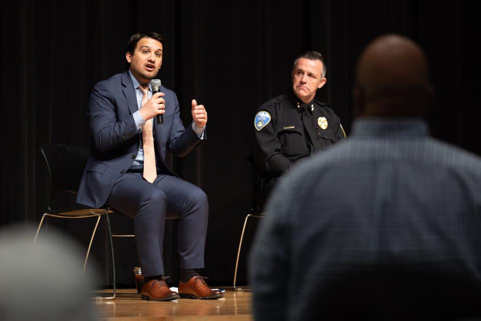 Akron Mayor Shammas Malik, left, and Deputy Chief Brian Harding, the nominee to become the city's police chief, lead a community forum Saturday morning at Buchtel CLC in Akron.