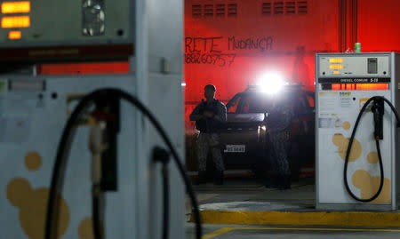 Brazilian Public-Safety National Force officers patrol the Pajucara neighborhood in Fortaleza, Brazil, January 7, 2019. REUTERS/Leonardo Benassatto