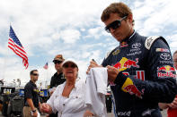 LONG POND, PA - AUGUST 05: Kasey Kahne, driver of the #4 Red Bull Toyota, signs autographs during practice for the NASCAR Sprint Cup Series Good Sam RV Insurance 500 at Pocono Raceway on August 5, 2011 in Long Pond, Pennsylvania. (Photo by Geoff Burke/Getty Images for NASCAR)