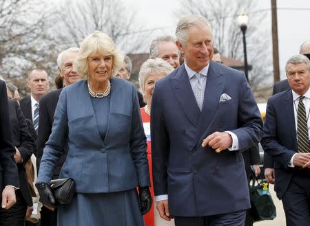 Britain's Prince Charles and Camilla, Duchess of Cornwall arrive at the Kentucky Center for African American Heritage in Louisville, Kentucky March 20, 2015. Britain's Prince Charles and the Duchess of Cornwall are on a four day trip to the United States. REUTERS/John Sommers II