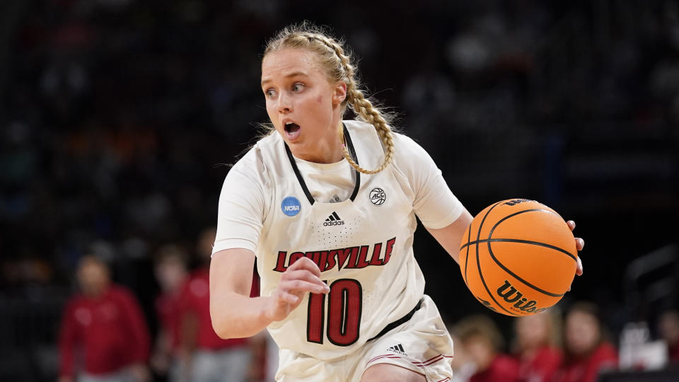 Louisville's Hailey Van Lith brings the ball down the court during the first half of a college basketball game against Tennessee in the Sweet 16 round of the NCAA women's tournament Saturday, March 26, 2022, in Wichita, Kan. (AP Photo/Jeff Roberson)