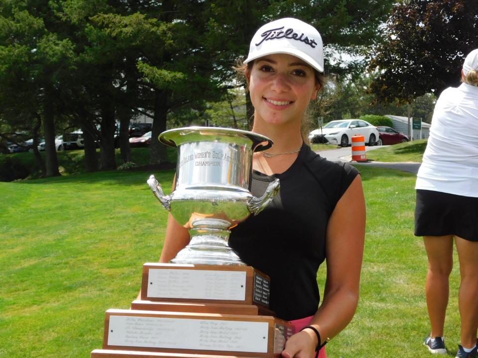 Olivia Williams celebrates with the trophy after winning the RI Women's Amateur at Kirkbrae Country Club on Saturday.