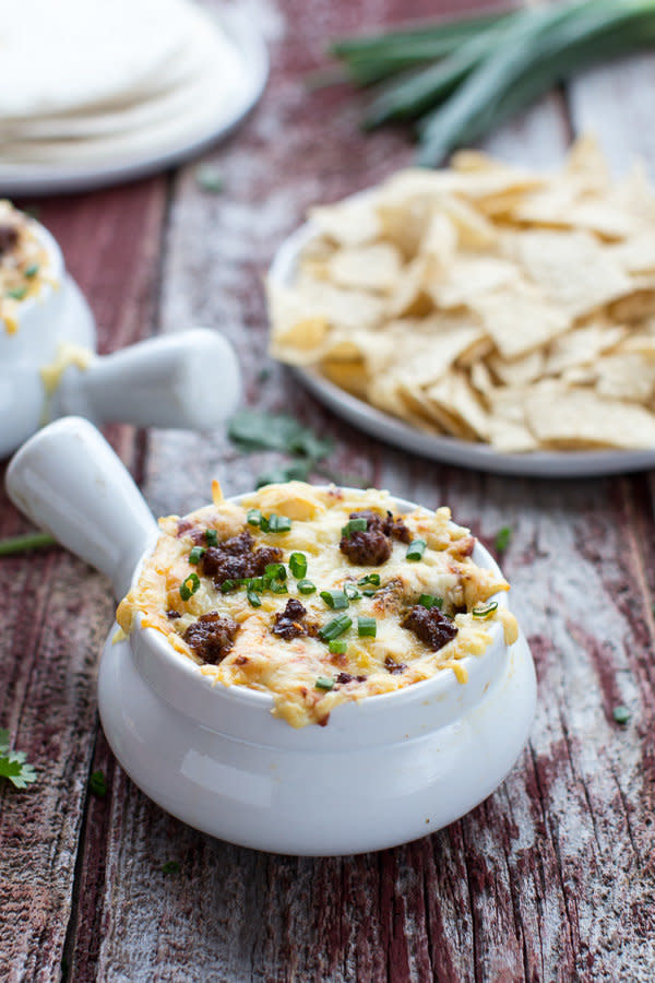 <strong>Get the <a href="http://www.halfbakedharvest.com/cheesy-fontina-chorizo-caramelized-onion-artichoke-dip/" target="_blank">Cheesy Fontina Chorizo and Caramelized Onion and Artichoke Dip</a> recipe from Half Baked Harvest</strong>