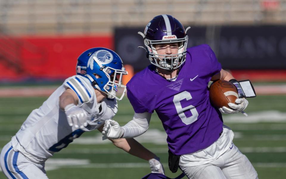 Rumson Nick Rigby looks for running from down sideline after a catch in the flat. Rumson-Fair Haven faces Caldwell in state title game